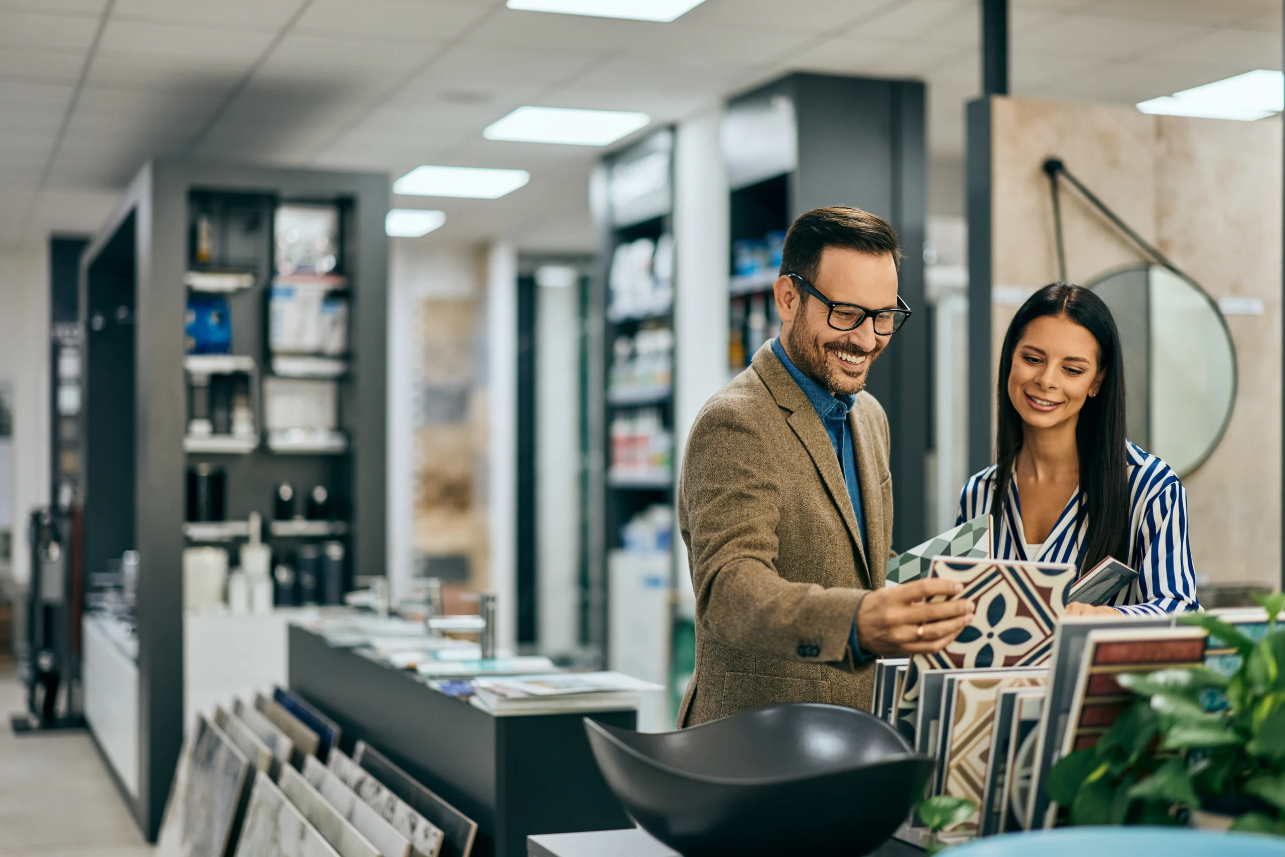 smiling-professionals-choosing-decorative-tiles-at-2025-09-01-15-58-19-utc_11zon